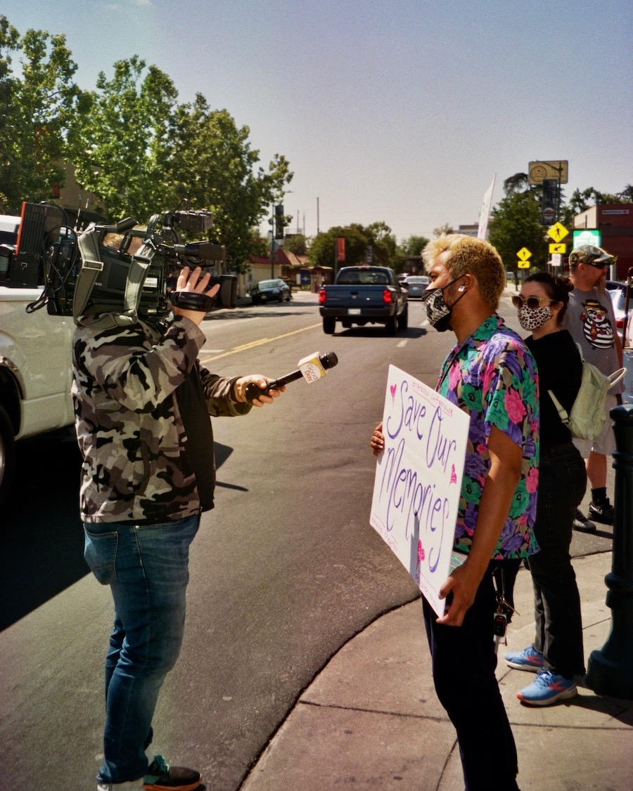 Placeholder contributor Orion Camero being interviewed by CBS13 News while protesting to preserve the iconic façade of the theater.